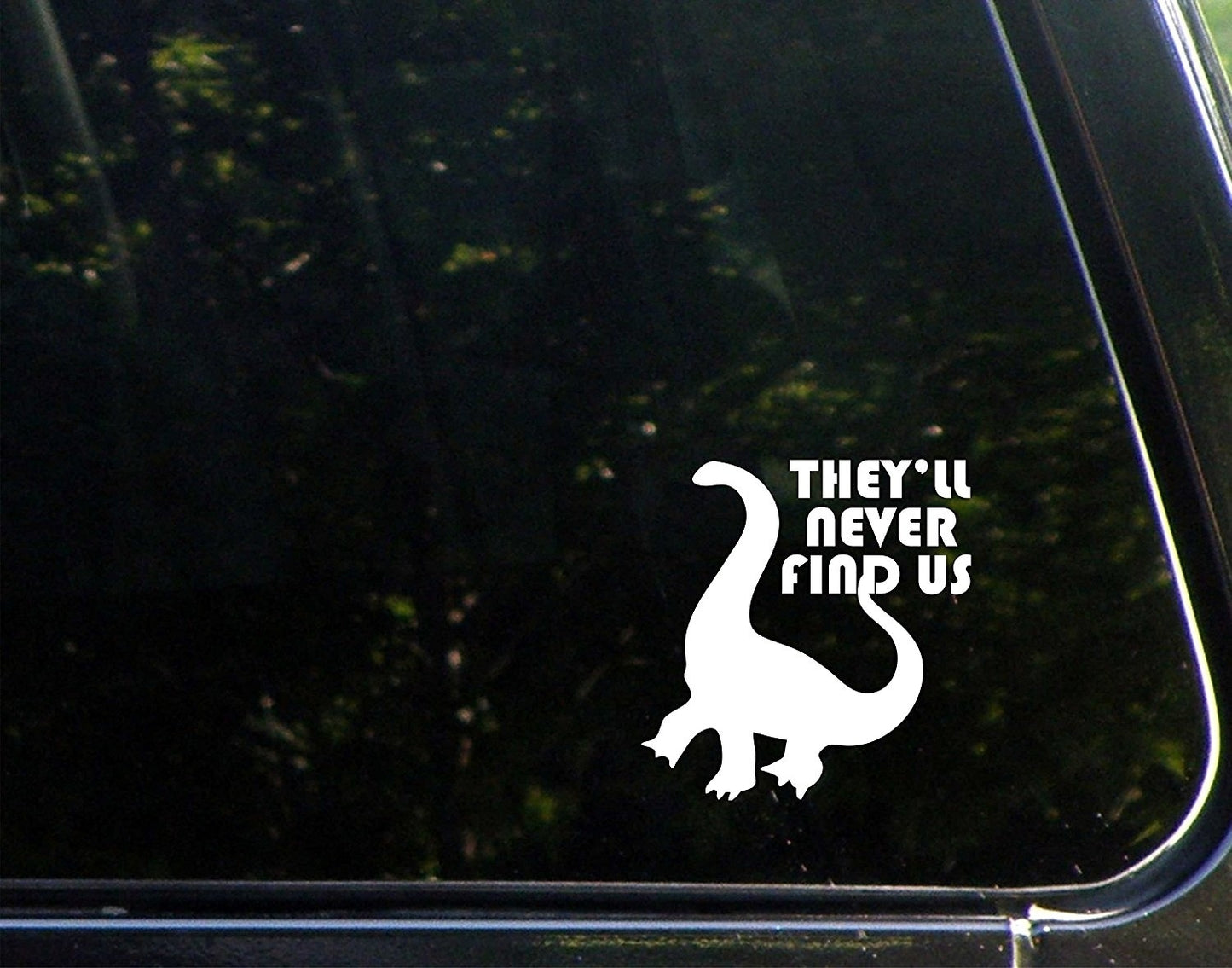 New Fashion They'll Never Find Us (dino) - 4inches X 4inches - Vinyl Die Cut Decal/ Bumper Sticker for Windows, Cars, Trucks, Laptops,  s, Etc.