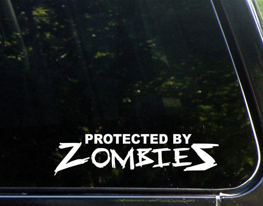 2018 NEW Protected by Zombies - 8inches X 2inches - Vinyl Die Cut Decal/ Bumper Sticker for Windows, Cars, Trucks, Laptops, Etc.